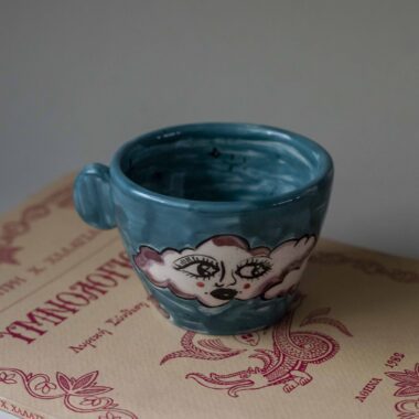 handmade ceramic mug with clouds and faces. an amazing perfect mug with celestial creatures perfect for capuccino and tea. Μια πανέμορφη χειροποίητη κούπα με συννεφάκια με πρόσωπα. Κατάλληλη για καπουτσίνο και τσάι.