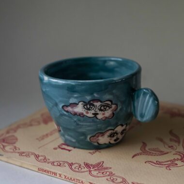 handmade ceramic mug with clouds and faces. an amazing perfect mug with celestial creatures perfect for capuccino and tea. Μια πανέμορφη χειροποίητη κούπα με συννεφάκια με πρόσωπα. Κατάλληλη για καπουτσίνο και τσάι.