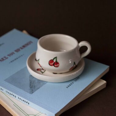 cute ceramic handmade cup with a saucer and fruits. Lemons, cherries and tangerines. perfect for espresso and single turkish coffee. Γλυκά χειροποίητα κεραμικά κουπάκια με πιατάκι και φρουτάκια. Κατάλληλη για εσπρέσο και μονό ελληνικό καφέ.