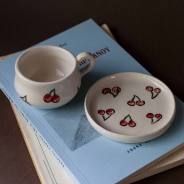 cute ceramic handmade cup with a saucer and fruits. Lemons, cherries and tangerines. perfect for espresso and single turkish coffee. Γλυκά χειροποίητα κεραμικά κουπάκια με πιατάκι και φρουτάκια. Κατάλληλη για εσπρέσο και μονό ελληνικό καφέ.