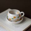 cute ceramic handmade cup with a saucer and fruits. Lemons, cherries and tangerines. perfect for espresso and single turkish coffee. Γλυκά χειροποίητα κεραμικά κουπάκια με πιατάκι και φρουτάκια. Κατάλληλη για εσπρέσο και μονό ελληνικό καφέ.