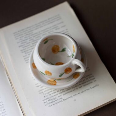 cute ceramic handmade cup with a saucer and fruits. Lemons, cherries and tangerines. perfect for espresso and single turkish coffee. Γλυκά χειροποίητα κεραμικά κουπάκια με πιατάκι και φρουτάκια. Κατάλληλη για εσπρέσο και μονό ελληνικό καφέ.
