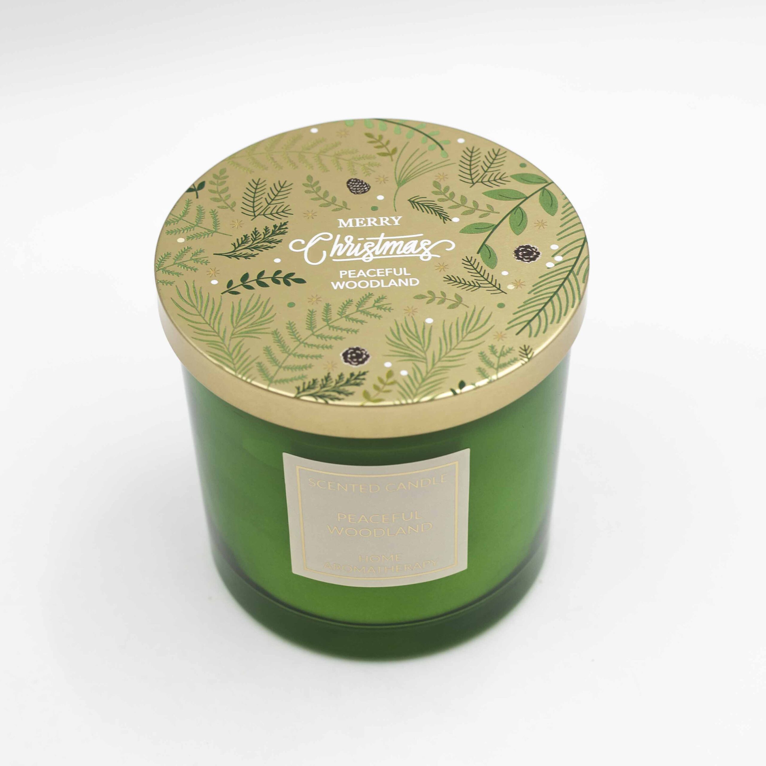 Μεγάλο κερί σε γυάλινο βαζάκι με άρωμα Spiced Berry, διακοσμημένο σε γιορτινό ύφος.Large glass jar candle with Spiced Berry fragrance in a festive design.