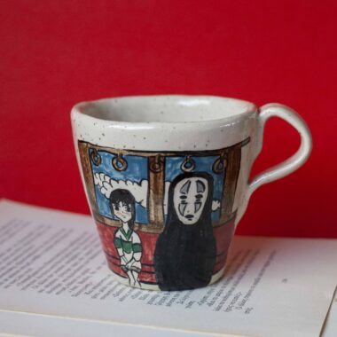 amazing mug painted with the spirited away scene of the train. And a quote from the movie on the back side. χειροποίητη κεραμική υπέροχη κούπα με την σκηνή από το τρένο από την χώρα των θαυμάτων και μια φράση από την ταινία στην πίσω πλευρά.