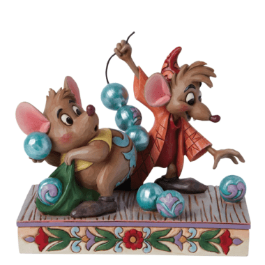 Discover the Jim Shore Disney Traditions “Beads for Cinderelly” Jaq & Gus Figurine, a must-have collectible for Cinderella fans and Disney enthusiasts. This beautifully hand-crafted and hand-painted sculpture showcases Jaq and Gus in a charming beaded scene inspired by the classic film. Featuring Jim Shore’s signature folk-art patterns, quilt-inspired details, and nostalgic craftsmanship, this piece makes the perfect addition to any Disney display or gift for collectors. Shop authentic Disney Traditions figurines for timeless artistry and storytelling.