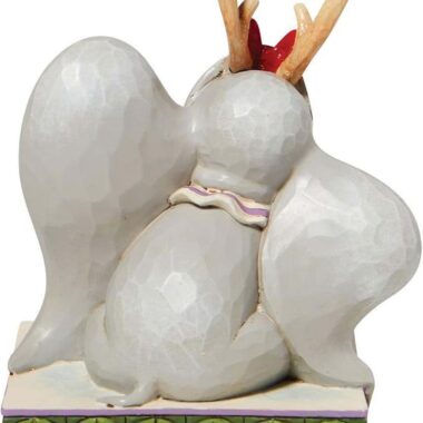 «Φιγούρα Disney Traditions του Jim Shore με τον Dumbo να φορά γιορτινά κέρατα τάρανδου, ζωγραφισμένη στο χέρι με folk-art μοτίβα.»