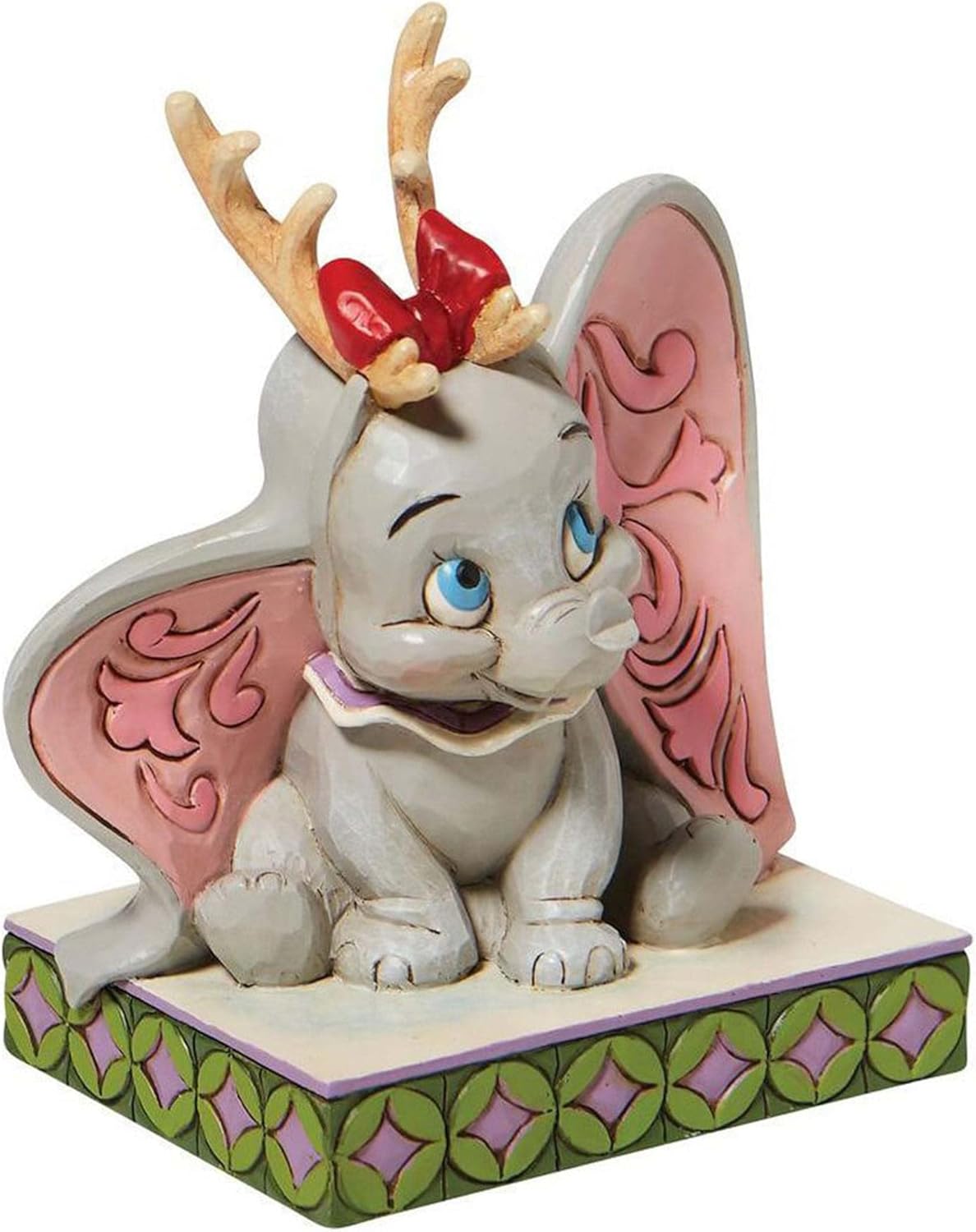 Προσθέστε χριστουγεννιάτικη μαγεία στη συλλογή σας με τη φιγούρα Dumbo με κέρατα τάρανδου από τη σειρά Disney Traditions του Jim Shore. Χειροποίητη και ζωγραφισμένη στο χέρι, με μοναδικά folk-art μοτίβα, αυτή η συλλεκτική φιγούρα είναι ιδανική για λάτρεις της Disney, της χριστουγεννιάτικης διακόσμησης και των δημιουργιών Jim Shore. Κατασκευασμένη από ποιοτική ρητίνη, αποτελεί ένα ζεστό και γιορτινό κομμάτι που ξεχωρίζει. Βρείτε αυθεντικές φιγούρες Disney Traditions για διαχρονική χριστουγεννιάτικη ατμόσφαιρα.
