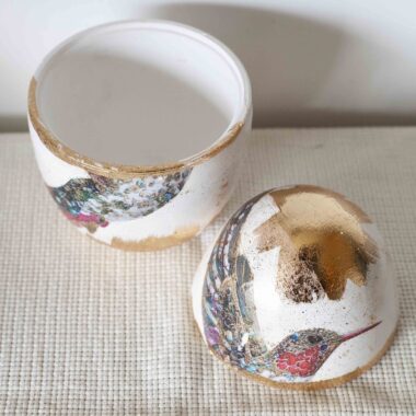 Decorative egg with colorful hummingbird and gold leaf details