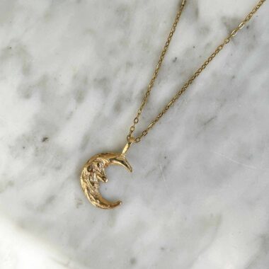 ορειχαλκοσ επιχρυσωμενος , ατσαλινη αλυσίδα, φεγγάρι με πρόσωπο σε χειροποιητη ρευστη μορφη κεριού, μισοφεγγαρο με προσωπο κολιε