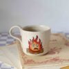 Handmade ceramic mugs with Calcifer design, beige speckled clay, small and large sizes, hand-painted fire character GR: Χειροποίητες κεραμικές κούπες με τον Calcifer, μπεζ πηλός με σαμότ, μικρά και μεγάλο μέγεθος