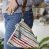 Handmade triangular bag with Greek rag rug pattern, leather handle, tassel and zipper GR: Χειροποίητο τριγωνικό τσαντάκι με μοτίβο κουρελούς, δερμάτινο χερούλι, φούντα και φερμουάρ