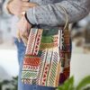 Handmade bag with ethnic patterns and colors, ring handle and button closure GR: Χειροποίητο τσαντάκι με ethnic μοτίβα και χρώματα, κρίκο για χερούλι και κούμπωμα με κουμπί