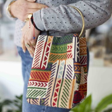 Handmade bag with ethnic patterns and colors, ring handle and button closure GR: Χειροποίητο τσαντάκι με ethnic μοτίβα και χρώματα, κρίκο για χερούλι και κούμπωμα με κουμπί