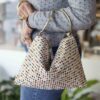 Handmade bag with double rings, zipper closure and colorful small diamond pattern on beige background GR: Χειροποίητο τσαντάκι με δύο κρίκους, φερμουάρ και μοτίβο με μικρούς χρωματιστούς ρόμβους σε μπεζ φόντο