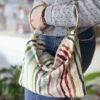 Handmade bag with Greek rag rug pattern, double metal ring handles and zipper closure GR: Χειροποίητο τσαντάκι με μοτίβο κουρελούς, διπλούς μεταλλικούς κρίκους και φερμουάρ