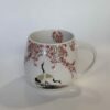 porcelain mug with cranes and cherry blossoms. Πορσελάνινη κούπα με γερανούς και άνθη κερασιάς