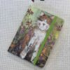 small notebook with orange kitty μικρό σημειοματάριο με πορτοκαλί γατούλα.