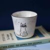handmade ceramic cup with cool kitties. χειροποίητη κεραμική κούπα χωρίς χερούλι με κουλ γάτες.