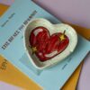 handmade ceramic ashtray with glittery heart. χειροποίητη κεραμική κούπα με καρδιά που λάμπει.