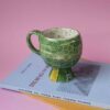 handmade green espresso mug with flowers. χειροποίητο κεραμικό φλιτζάνι με λουλούδια.