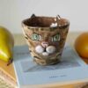 handmade ceramic mug with tabby cat and white snout. χειροποίητη κεραμική κούπα γάτα με λευκή μουσούδα.