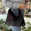 χειροποίητη τσάντα με μαύρη συνθετική γούνα και μεταλλικούς κρίκους για χερούλια. handmade fake furry bag in black color with 2 two metallic hoops for handles